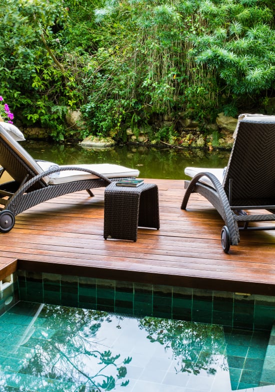 Poolside relaxation wooden deck at Grand Velas Resorts