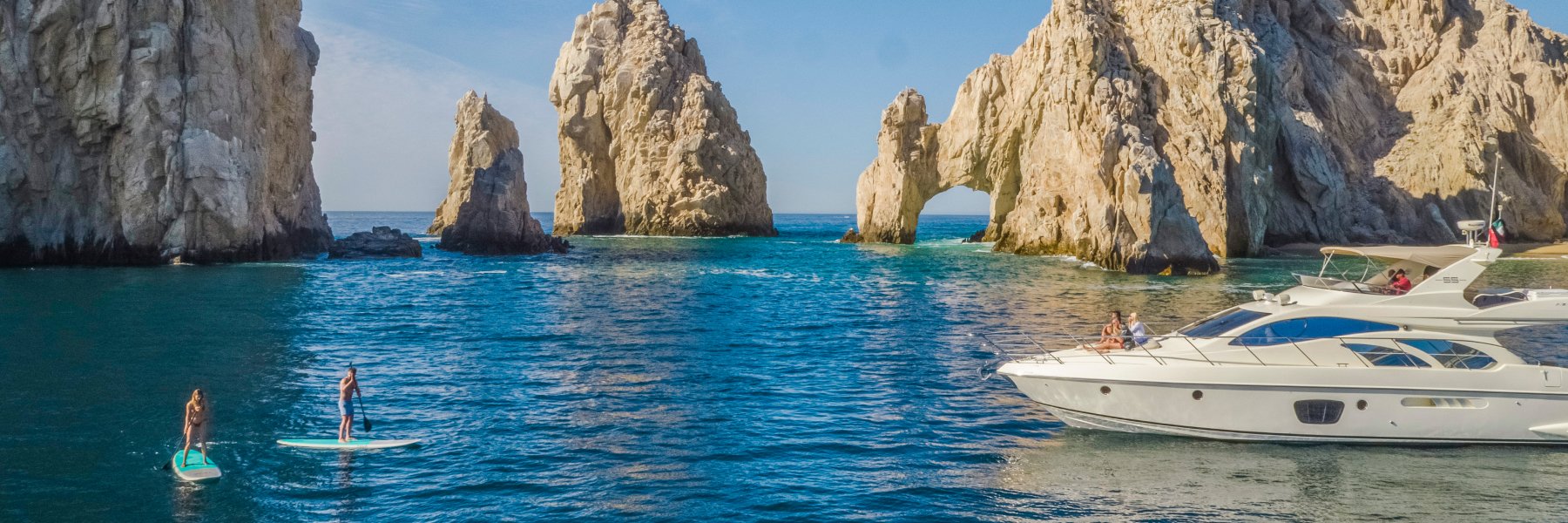 A boat docked near ocean near Los Cabos Hotel of Grand Velas