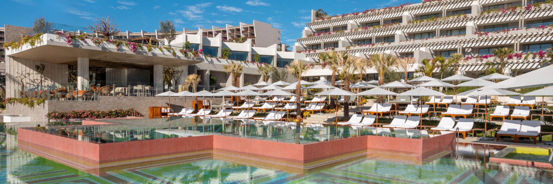 Pool at Grand Velas Resorts with lounge chairs and umbrellas, Nuevo Vallarta Nayari