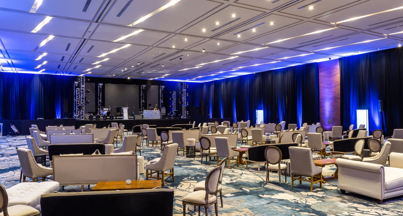 Ballroom with seating and tables at Grand Velas Los Cabos